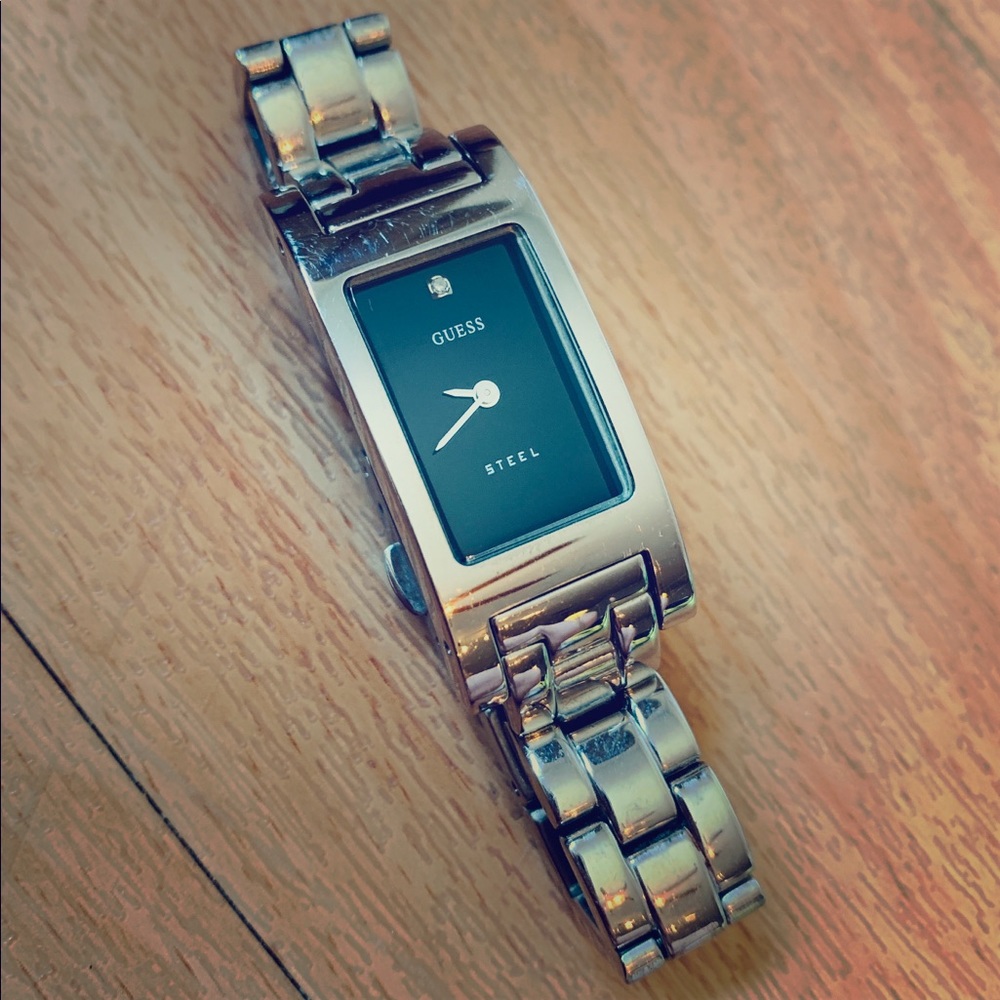 Guess wristwatch. Slightly worn.